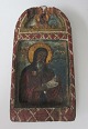 Græsk ikon, 19. 
årh. Bemalet. 
Med figurer. 
H.: 14,5 cm. 
B.: 7,5 cm. Med 
afslag. 