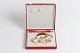 Georg Jensen 
juleuro 1985 by 
Jeanne Grut
Fremstillet af 
24 karat guld 
belagt messing
Fin ...
