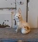 Skøn candy 
container i 
form af hund i 
hvidt skind.
Sjældent at se 
i så fin stand.
Højde 17cm.