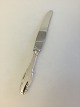 Frijsenborg 
Sølv Spisekniv 
med stål blad 
W. & S. 
Sørensen
Måler 24.1 cm 
L 
Vejer 69 g