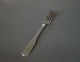Dinner fork in 
Thirslund - 
Hans Hansen, 
hallmarked 
silver.
20 cm.
Ask for number 
in stock. ...