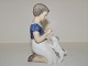 Bing & Grøndahl figur, pige med hundehvalp.Af fabriksmærket ses det, at denne er produceret ...