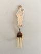 Anton Michelsen 
1916 Christmas 
fork in gilded 
sterling 
silver. Marie 
Henriques 
designed the 
...