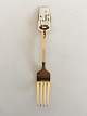 Anton Michelsen 
Christmas Fork 
1949 Gilded 
Sterling Silver 
with Enamel
The Advent 
wreath adorns 
...