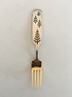 Anton Michelsen 
Christmas Fork 
1950 Gilded 
Sterling Silver 
with Enamel
Four green, 
undecorated ...