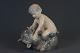 Porcelænsfigur: 
Royal 
Copenhagen, Pan 
med bjørn, h: 
19 cm