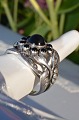 Georg Jensen 
agatering with 
cabochan-cut 
black agate in 
sterling 
silver. Design 
no. 10. Size 54 
...