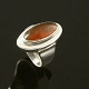 N.E. From. 
Sterling Silver 
Ring with 
Amber.
Designed by 
Niels Erik From 
1944-2009
Stamped. ...