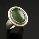 Hans Hansen. 
Sterling Silver 
Ring with 
Nephrite
Produces by 
Hans Hansen.
Stamped HH 
monogram, ...