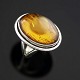 Danish Sterling 
Silver Ring 
with Amber
Stamped 925.
Size. 56mm.
Face measures 
2.9 x 2.3 ...