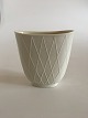 Cremefarvet 
Retro Moderne 
Vase fra 
Rosenthal. 12.5 
x 12 cm. I 
perfekt stand.