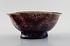 Skandinavisk 
keramiker, 
keramikskål med 
violet glasur.
Utydeligt 
signeret.
Måler : 14,5 
cm. x ...