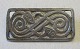 Brosche i 
sterling sølv, 
Vikinge kopi, 
20. årh. 
Danmark. 3,6 x 
1,8 cm. 
Stemplet: 925 
s. G. Ph.