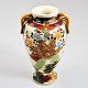 Satsuma vase, 
Japan, 19. årh. 
Fajance. 
Polycrom 
dekoration i 
form af 
krigere. Med 
hanke. H: 26 
...