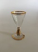 Holmegaard Ida 
Snapseglas med 
optiske striber 
og guld.
Design: Jacob 
E. Bang
Holmegaards 
...