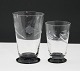 Kastrup 
glasværk 1938, 
Lis glasserie 
blomst slibning 
med sort fod.
Øl. Højde 11,5 
cm. Pris: ...