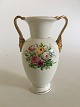 Bing & Grondahl 
tidlig vase med 
slangehåndtag.
Måler 23cm / 
9". I god 
stand, men har 
slid og ...