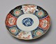 Japansk Imari 
porcelænstallerken, 
19. årh. 
Dekoreret med 
planteornamentik 
og traner. 
Diameter: ...