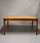 Spisebord i 
teak med udtræk 
designet af 
Henning 
Kjærnulf og 
fremstillet af 
Vejle stole og 
...