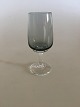 Holmegaard 
"Atlantic" 
Snapseglas. 9,5 
cm H. Røgfarvet 
glas med klar 
stilk. Designet 
af Per ...