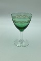 "Ejby" 
Hvidvinsglas 
med Lysgrøn 
Kumme. 
Holmegaard. 12 
cm H. Designet 
af Jacob E. 
Bang for ...