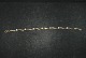 Armbånd med 
Zirkoner, Guld 
14 Karat 
Stemplet: GJ, 
NOA, 585
Længde 17 cm.
Bredde 4 ...