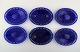 William Steberg 
for Gullaskuf. 
Seks ovale 
tallerkener i 
mørkeblåt 
kunstglas.
Måler : 22,5 
cm. x ...