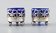 A pair of English salt cellar with glass inserts in blue of English silver 
plate.