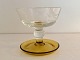 Kastrup 
Glasværk, Lis, 
Dessert skål på 
ravgul fod, 9cm 
høj, 10cm i 
diameter 
*Perfekt stand*