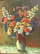 C. F. Behrens. 
født 1902
Sommerblomster 
i vase. Mål 
74x66 cm, med 
ramme: 82x74 cm
