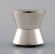 Jens H. Quistgaard style of. Danish design, 1960 s.
Double-sided candlestick in silver-plated metal.