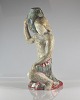 Stor figur i 
keramik med 
motiv af  
kvinde med 
vandkrukke nr. 
4815
Design af 
Michael 
Andersen, ...