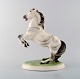 Keramos, Wien. 
Stejlende hest, 
figur i 
porcelæn. Flot 
figur, ca. 
1940erne.
Måler : 31 cm. 
x 25 ...