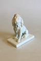 Bing & Grøndahl 
Bisquit 
Siddende løve. 
Måler 13 cm