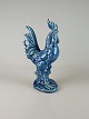 Figur af hane i 
blåglaseret 
keramik
Design ukendt
Hanefigur, 
figur, keramik, 
porcelæn, ...
