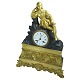 Fransk bronzeur. Forgyldt fransk bronzeur, nyrokoko. Kamin ur i brunpatineret bronze med ...