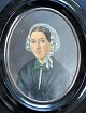 Danish artist 
(19th century): 
Female 
portrait. Oil 
on cardboard. 
Oval. Unsigned. 
18.5 x 14 ...