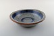 Helle Allpass 
(1932-2000). 
Low bowl of 
glazed 
stoneware in 
beautiful blue 
and grey glaze 
with ...