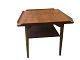 Table with 
hooked upwards 
sides and a 
shelf
Unknown
Teak wood
Width and 
length 60 cm, 
Height 61 ...