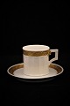 Small coffee cup / Espresso cup in Gold Fan from Royal Copenhagen.
Cup Dia.:6cm.