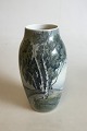 Bing & Grøndahl 
Art Nouveau 
vase No 243. 
Signeret A. J. 
Schou. Måler 
24,5 cm