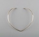 N.E. From sterling silver neck ring. Danish design 1970