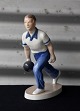 Figur i 
porcelæn med 
motiv af mand 
med 
bowlingkugle. 
Nr. 2488
Design af Bing 
og Grøndahl
 ...