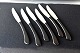 Bordknive - med 
sort skaft af 
kunstmaterial - 
skafter af stål 
fra Rådvad. 6 
stk bordknive 
IHQ. ...
