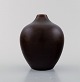 Triller Tobo, Sweden. Stylish unique vase in glazed ceramic. Beautiful glaze in 
brown shades. 1970