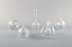 Edward Hald for Orrefors. A collection of five mouth blown flacons in clear art 
glass. Designed in the 1940