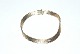 Brick Bracelet, 
7 rd Gold 14 
Karat
Stamped: 585, 
SAV
Length 20.5 
cm.
Width 6.97 ...
