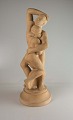 Figur i keramik 
med motiv af 
mand og kvinde 
i åben 
omfavnelse
Keramik, 
keramikfigur, 
...