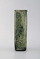 Gutte Eriksen, own workshop. Vase in glazed ceramics. Raku burned technique. 
1950