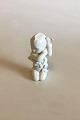 Bing & Grøndahl 
Blanc de Chine 
Figur af 
Havbarn med 
tang No 2267. 
Måler 11 cm